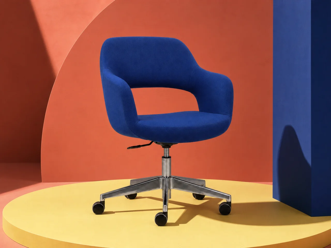 After: A cobalt chair moved from a plain studio into a colorful campaign set